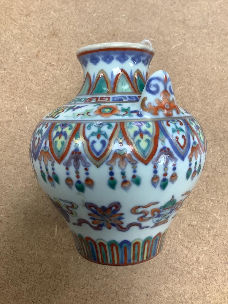 A Chinese doucai vase, 12cm high